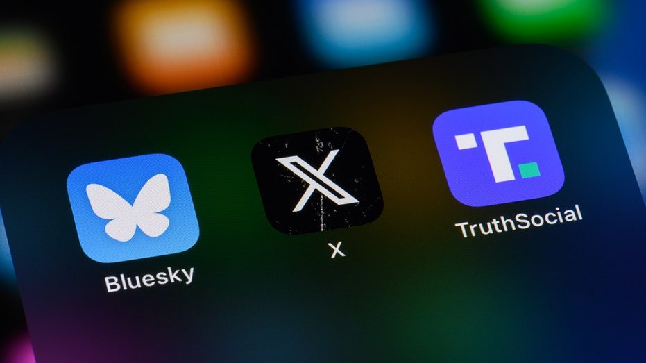 X app on the iPhone screen with other social media icons