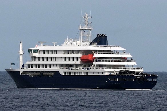 The MV Hondius anchored at a port in Praia, Cape Verde.