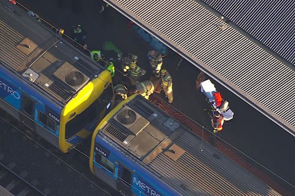 Emergency services at North Melbourne station on Monday afternoon.