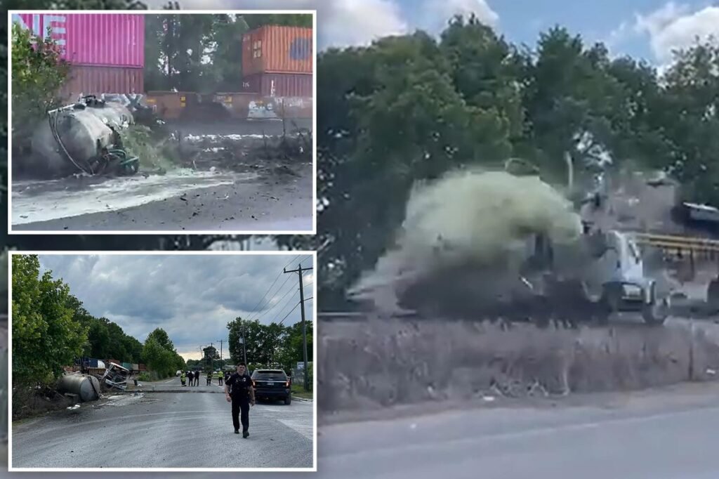 Horror as train collides with truck carrying septic tank, seriously injuring driver: video Horror as train collides with truck carrying septic tank, seriously injuring driver: video