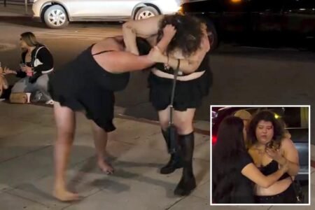 Wild street fight between two women leaves one bruised and bloodied