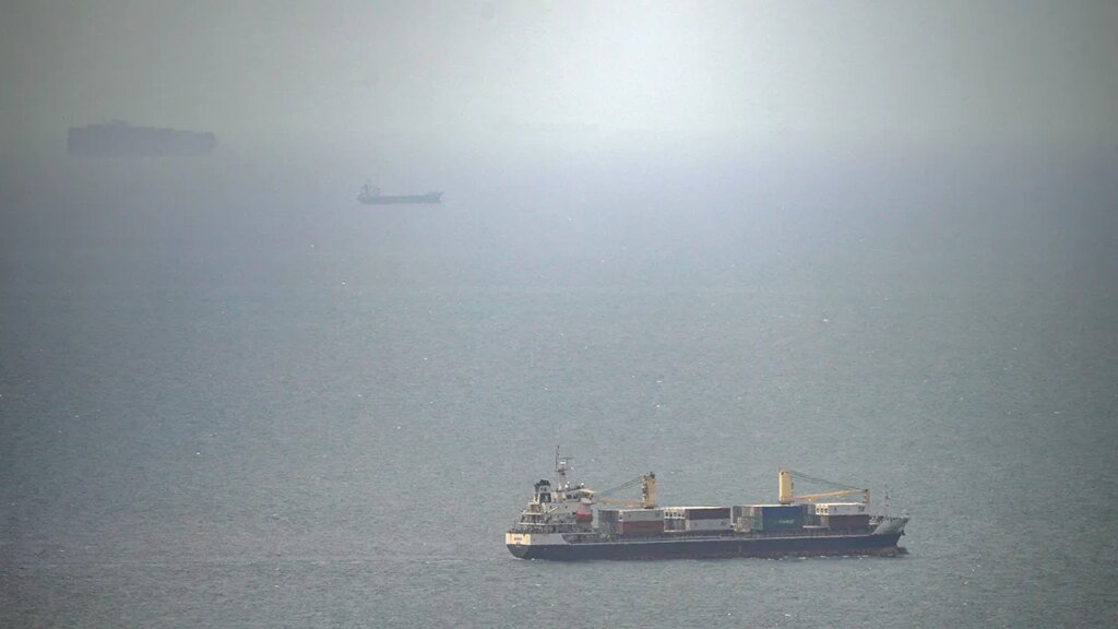 Cargo ship attacked by small craft near Strait of Hormuz, UK maritime agency says