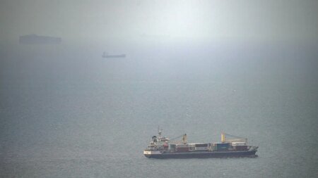 Cargo ship attacked by small craft near Strait of Hormuz, UK maritime agency says