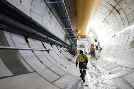 Water torrents gush through tunnel amid project challenges