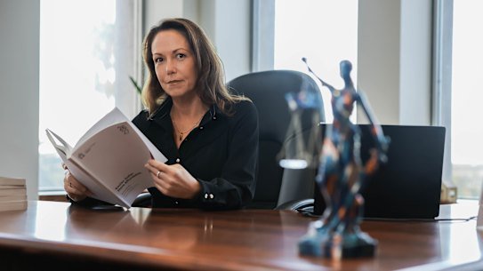 Victorian Treasurer Jaclyn Symes in her office with the 2026-27 budget papers.