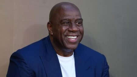 NBA legend Magic Johnson breaks from his former Lakers boss to endorse Karen Bass in LA mayoral race