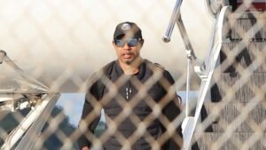 Tiger Woods spotted getting off private plane after weeks of treatment in Switzerland following DUI arrest