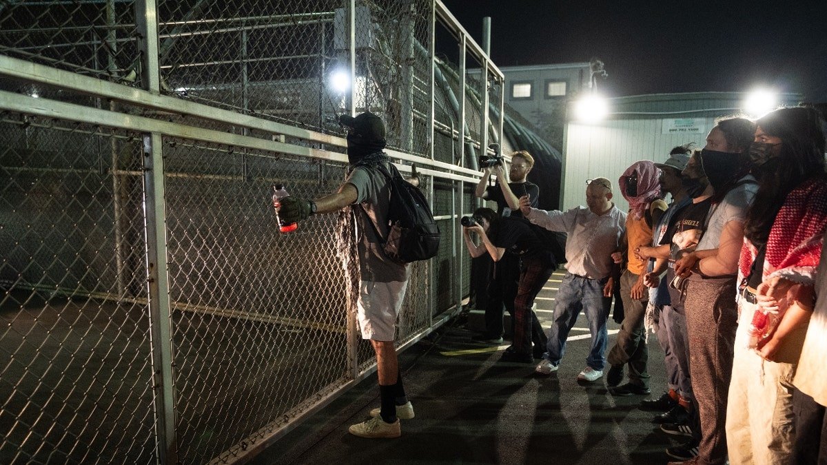 Protesters blocking vehicles at Delaney Hall ICE facility in Newark