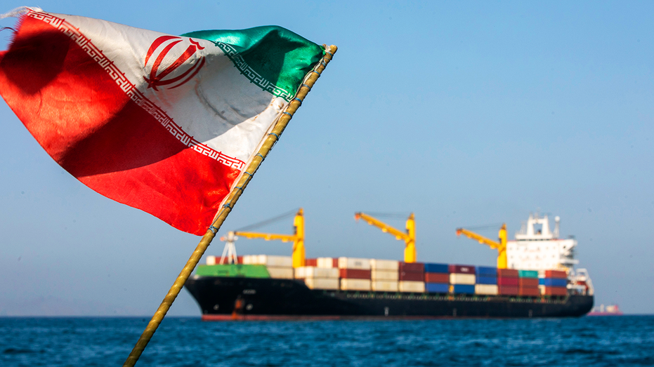 Iranian flag flying in the Strait of Hormuz