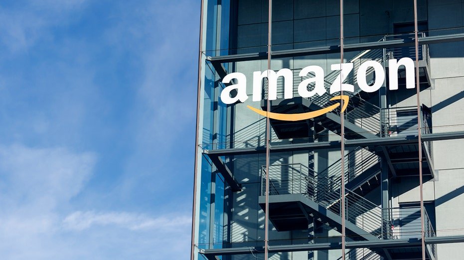 Exterior view showing the Amazon logo mounted on the building housing the company’s German headquarters in Munich.