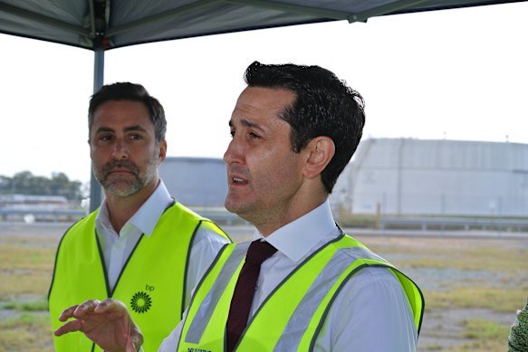 Premier David Crisafulli (right) speaks alongside BP’s Paul Auge at Bulwer Island on Sunday.