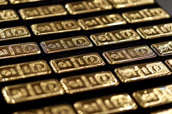 A generic image of gold bullion. The woman and two accomplices were arrested after allegedly using funds from an email scam to buy the precious commodity.
