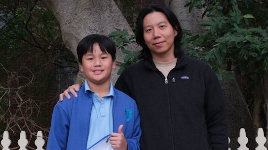 William Yu with his father Bruce ahead of sitting the entrance test at North Sydney Girls on Friday.