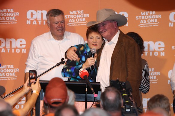 One Nation MP Barnaby Joyce embraces party leader Pauline Hanson.