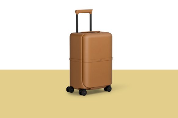 July “Capsule Carry On Pro” suitcase.