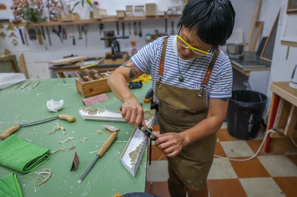 Chapman and Bailey’s Ying Huang is among Australia’s last ornamental specialists using traditional framing techniques.