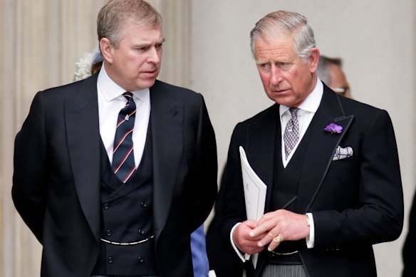 Then Prince Andrew and his brother, then Prince Charles, pictured together in 2012. 