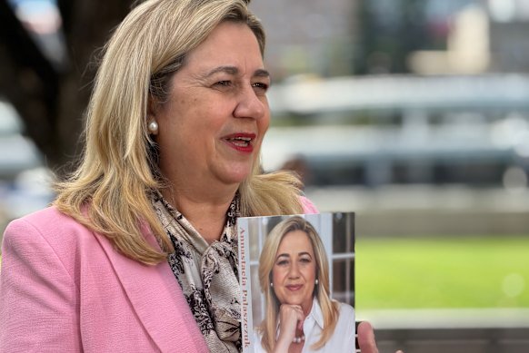 Former Queensland premier Annastacia Palaszczuk with her memoir, The Politics of Being Me, in Brisbane last week.