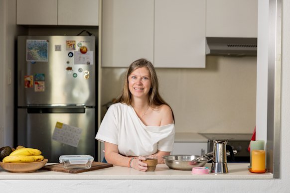 Plastic-free advocate Sarah Rhodes pictured at her home in Mosman with her collection of glass storage containers and sustainable kitchenware.