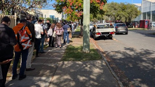 Northside commuters wait for replacement buses to continue their journey.