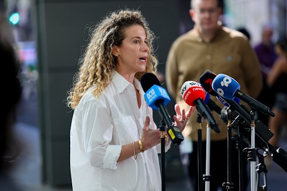 Dina, one of the witnesses, speaks to the media after addressing the royal commission.