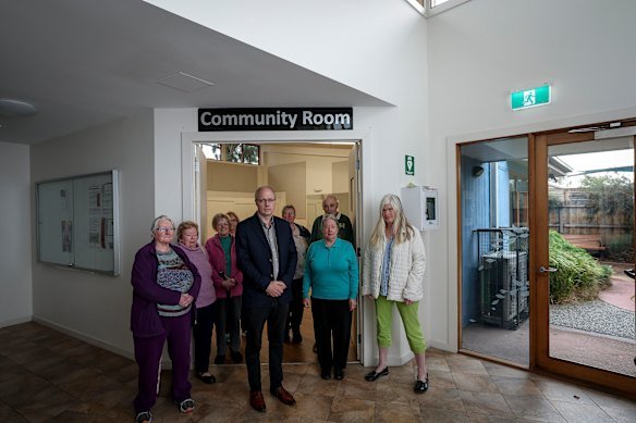Pastor John Edmonds (centre) and members of the Doreen Baptist Church.