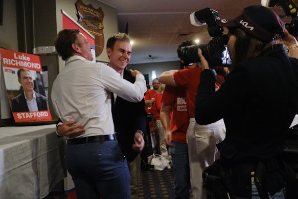 Opposition Leader Steven Miles and Stafford candidate Luke Richmond  celebrate Labor’s narrow byelection win.