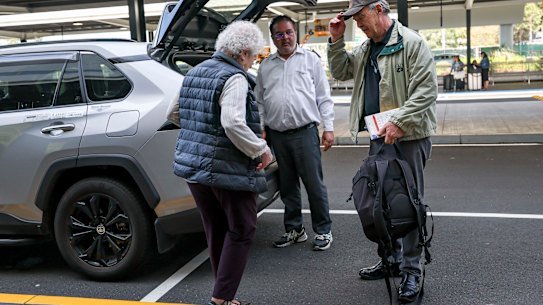 Travellers Karen Senter and David Macenulty gave up trying to use the taxi prepaid kiosk after several attempts. 