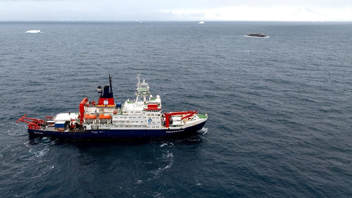 View of Polarstern research vessel near uncharted island