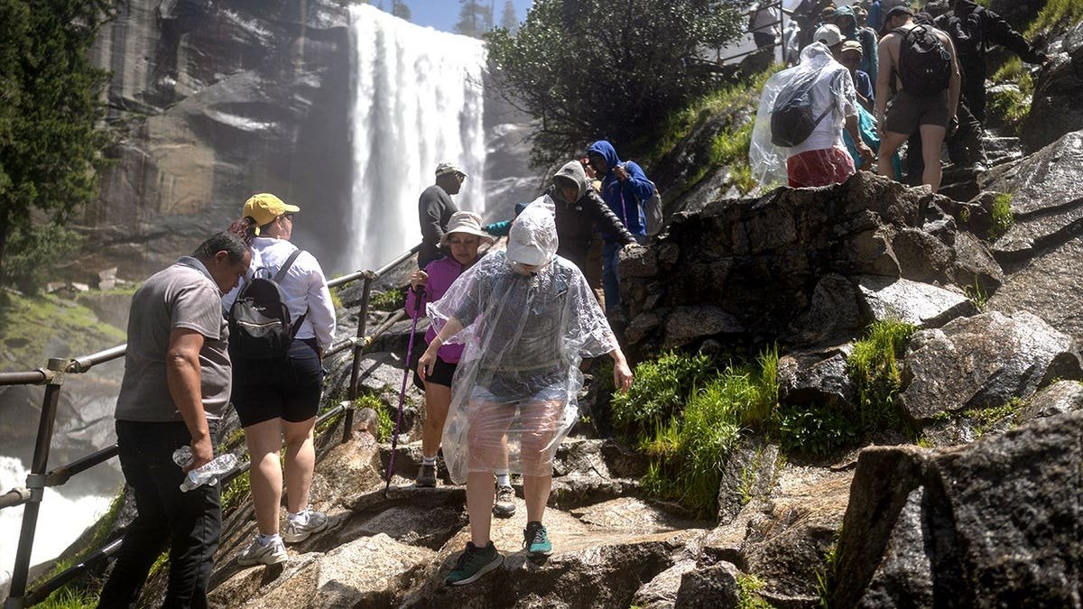 Crowded visitors near Yosemite waterfall