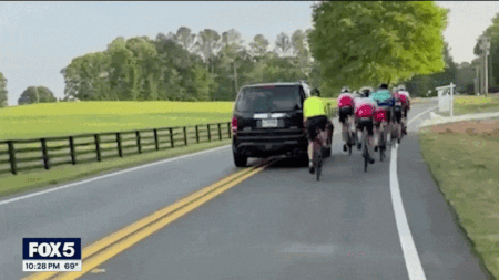 WATCH: Driver smirks in mugshot after allegedly hitting group of cyclists in caught-on-camera road rage