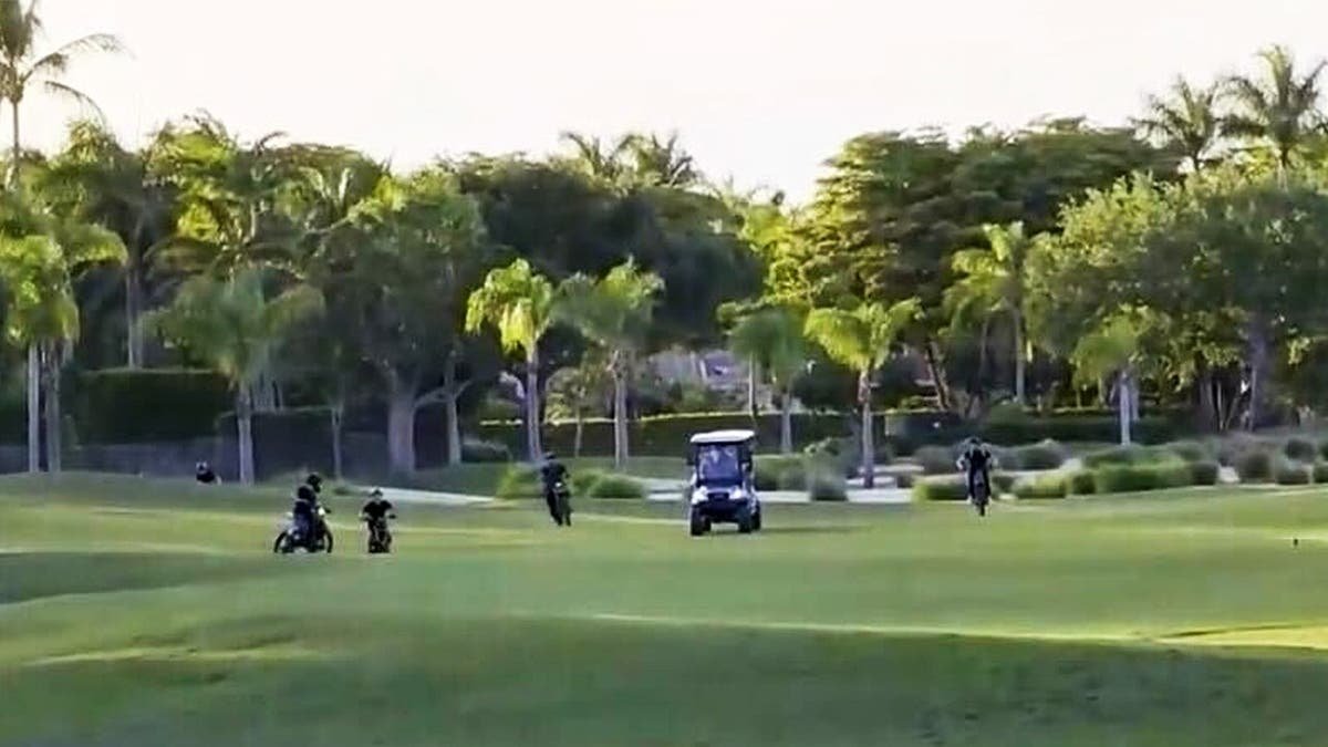 Group of teens on Florida golf course.