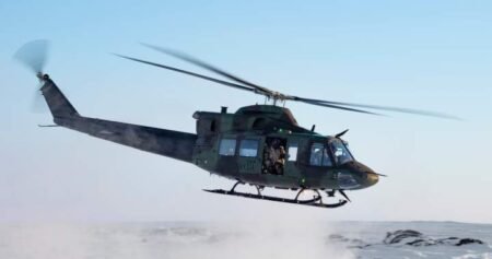 Military helicopter flyover taking place in Edmonton during fallen EMS memorial