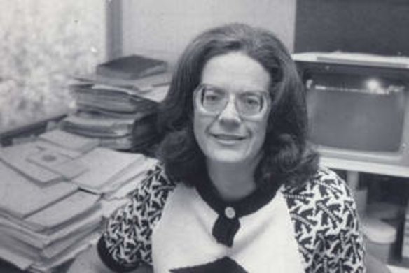 Michelle Grattan surrounded by files in The Age bureau in old parliament house.