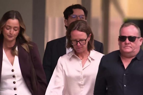 WA Police assistant commissioner Gailene Hamilton (centre, white shirt), arrives at Perth Magistrates Court on Monday.