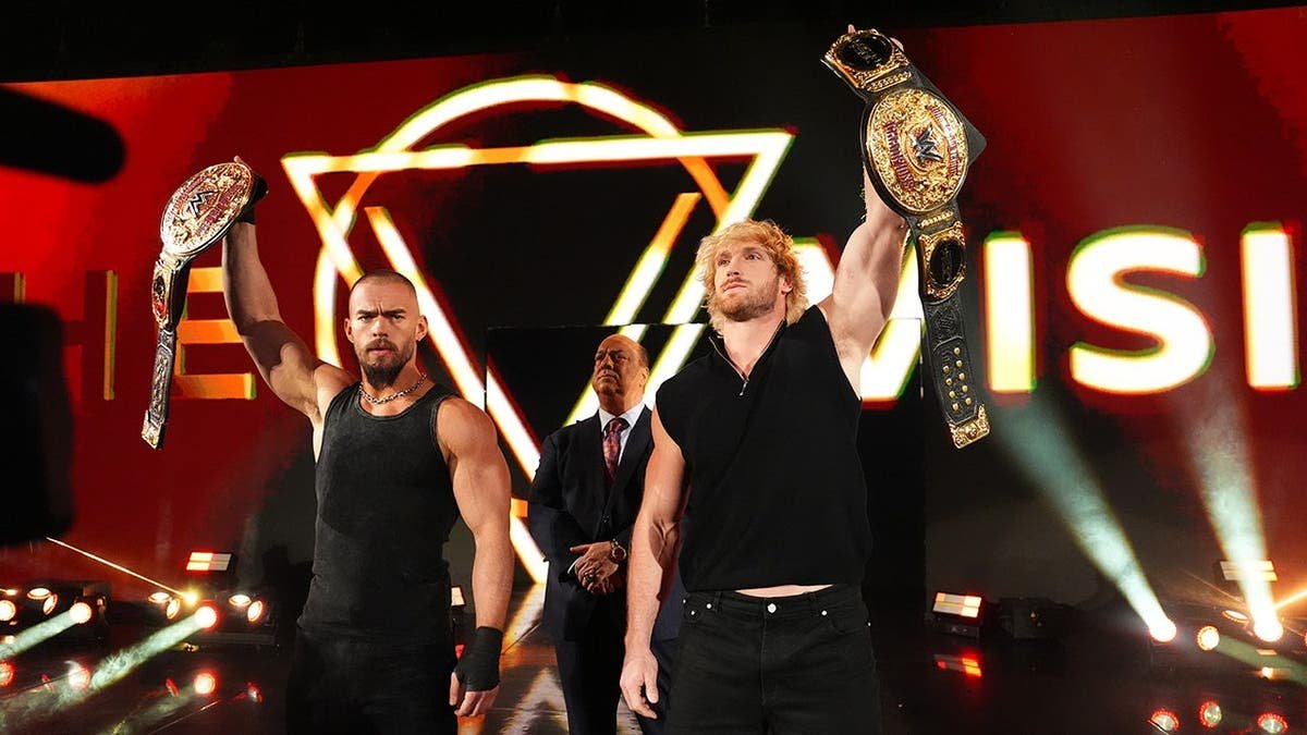 Austin Theory, Paul Heyman, and Logan Paul entering arena during Monday Night RAW in Las Vegas