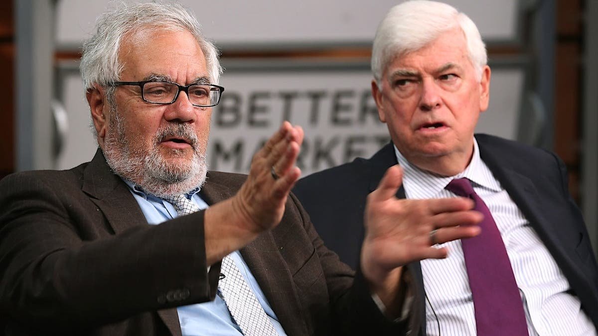Barney Frank and Chris Dodd standing together in Washington, D.C.