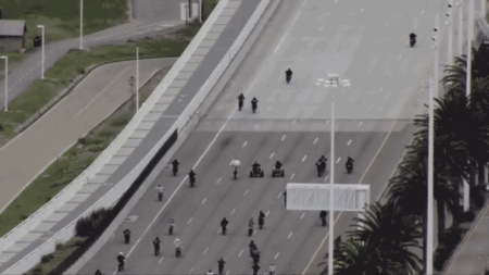 Video shows bridge turn into burnout bonanza in stunt-happy takeover – police swoop in to cuff road rebels