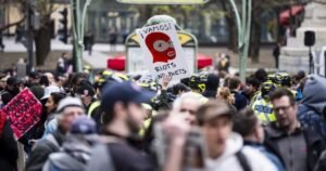 Mock beheading of Quebec labour minister at May Day protest draws outrage