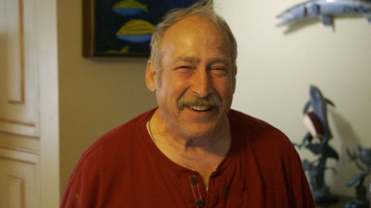 Benjaman Kyle smiling and looking at the camera
