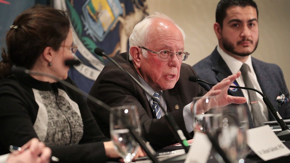 Sen. Bernie Sanders speaking with Dr. Abdul El-Sayed and Dr. Alison Galvani at a roundtable in Detroit