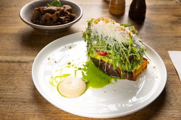 The avocado breakfast bruschetta with a side of mushrooms at the Grain Store. 