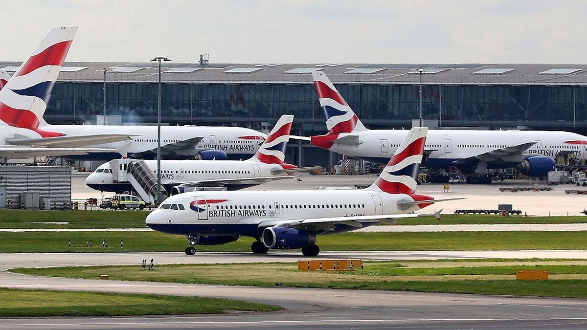 A British Airways Airbus A319 taxiing near Heathrow Airport Terminal 5 in London