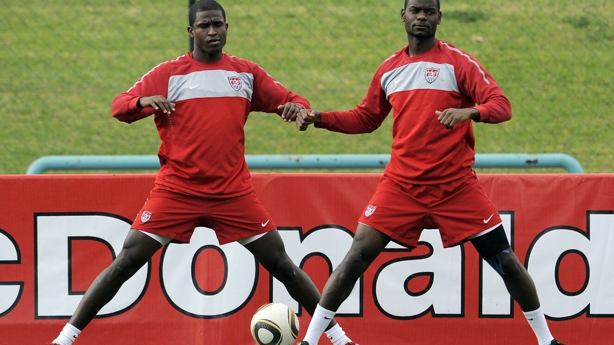 Striker Edson Buddle (left) and Maurice Edu train during the buildup to the 2010 World Cup in South Africa. (Getty Images)