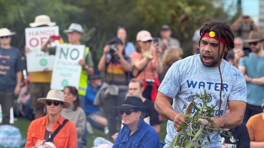 Derek Oram Sandy performing a welcome ceremony at a Save Victoria Park rally on Sunday.