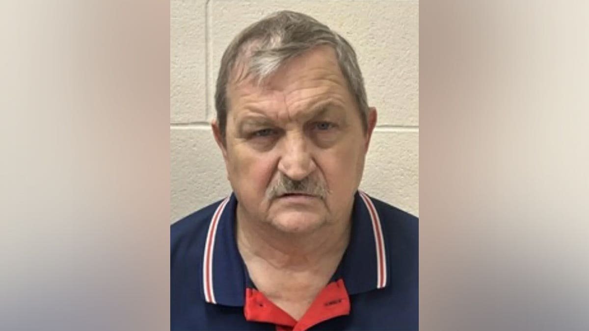 Charles Berry standing in a courtroom