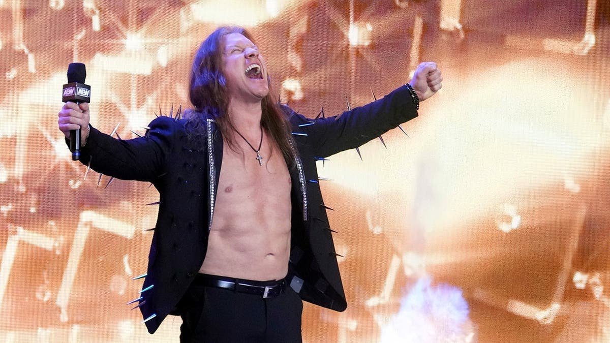 Chris Jericho standing in wrestling ring during AEW Dynamite at Footprint Center
