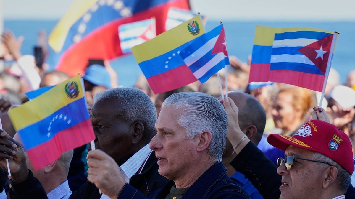 Cuban President Miguel Diaz-Canel greeting supporters at a rally in Havana