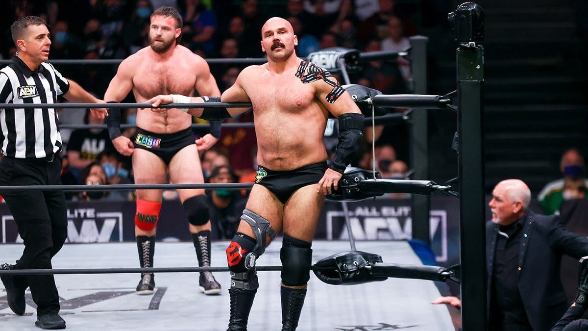 Dax Harwood standing in the corner of a wrestling ring.