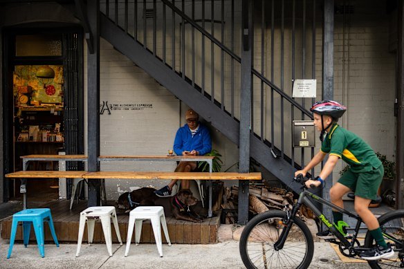 People, and dogs, at The Alchemist Espresso on Carter Street. 